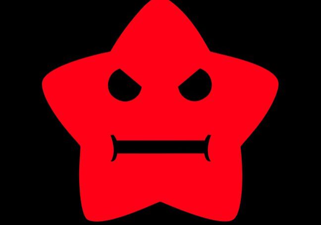 A red star with an angry face on a black background.